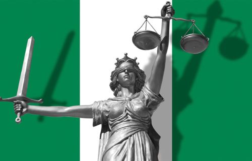 Nigerian flag with a figure of lady justice standing in front