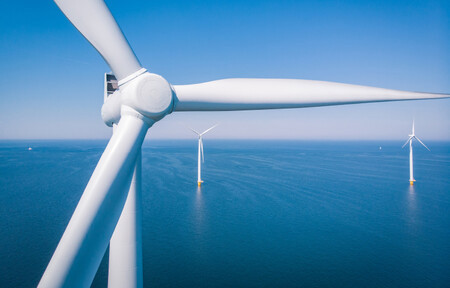 An offshore wind farm image of three turbines